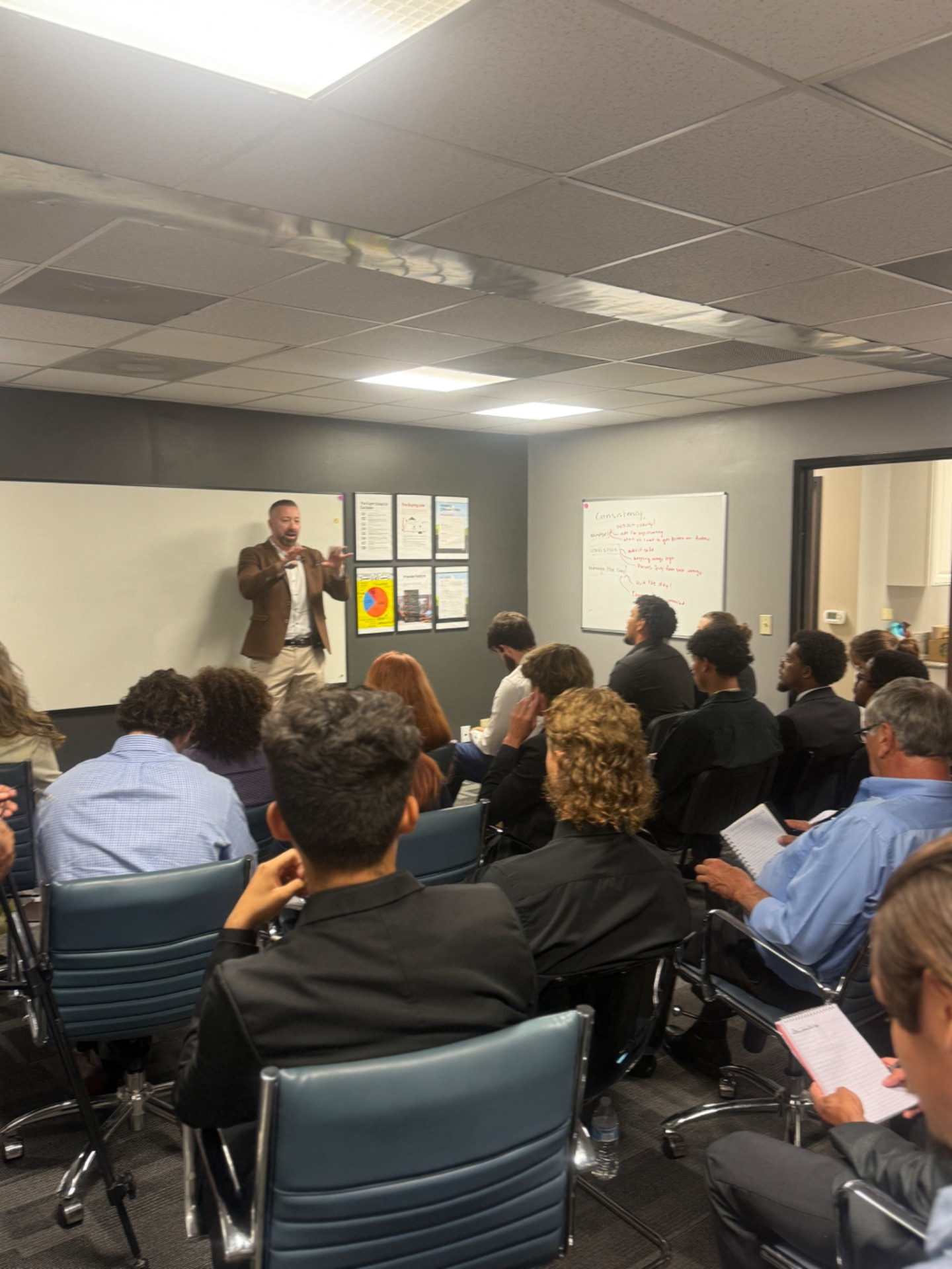 A ZG training session in the office with the full team taking notes