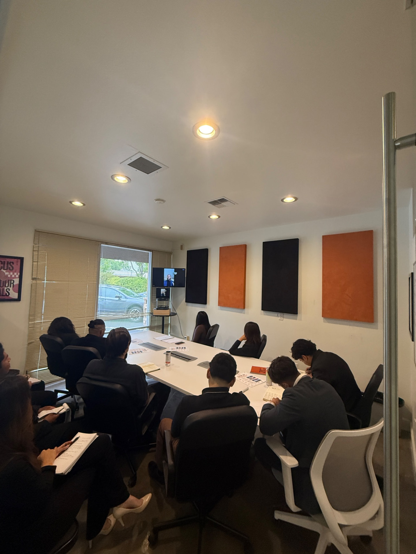 The ZG team in a campaign briefing around the conference table